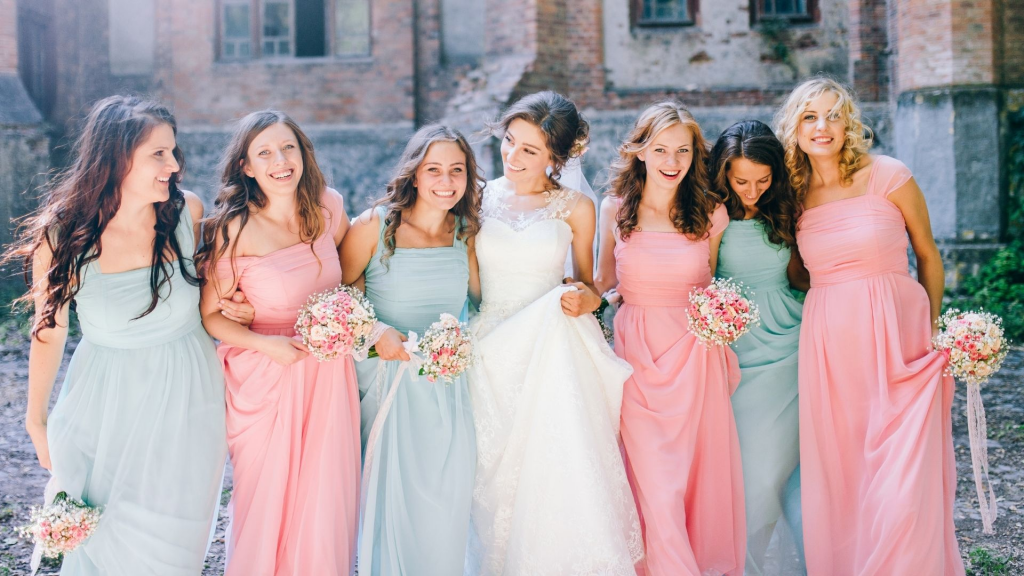 A photo of brides maids in dresses