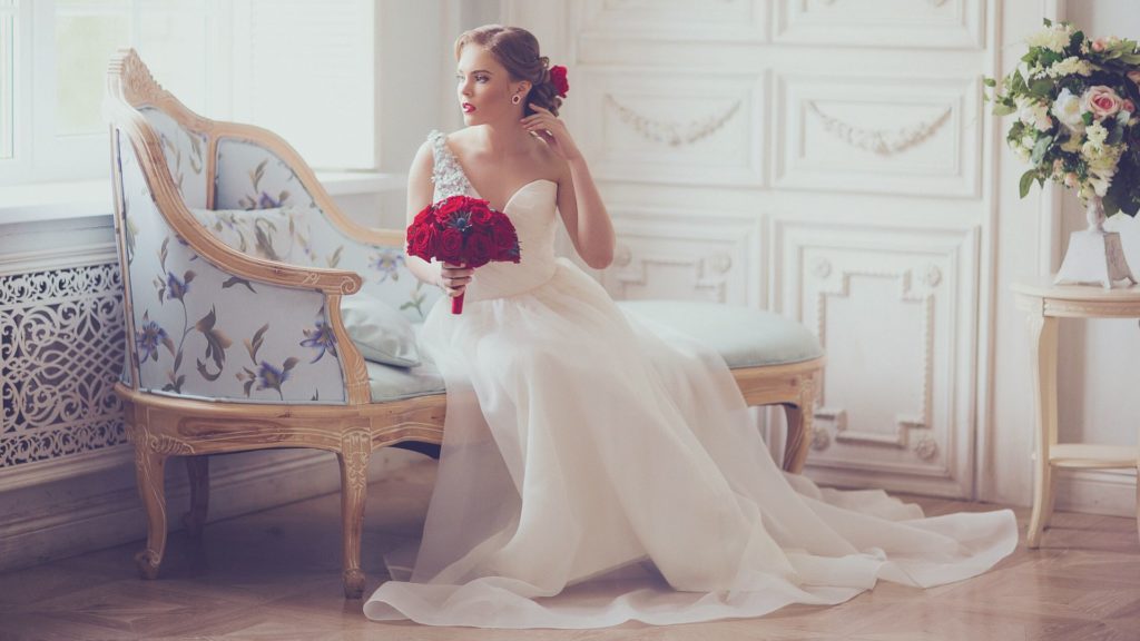 The Different Types of Bridal Gown Bustles Explained